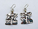 Thumbnails of silver earrings